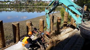 Drilling Of Tie Back Anchors For Timber Pole Retaining Wall